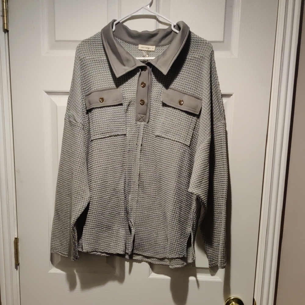 Gray Button-Up Waffle Knit Shirt  With Front Pockets And Side Slits.